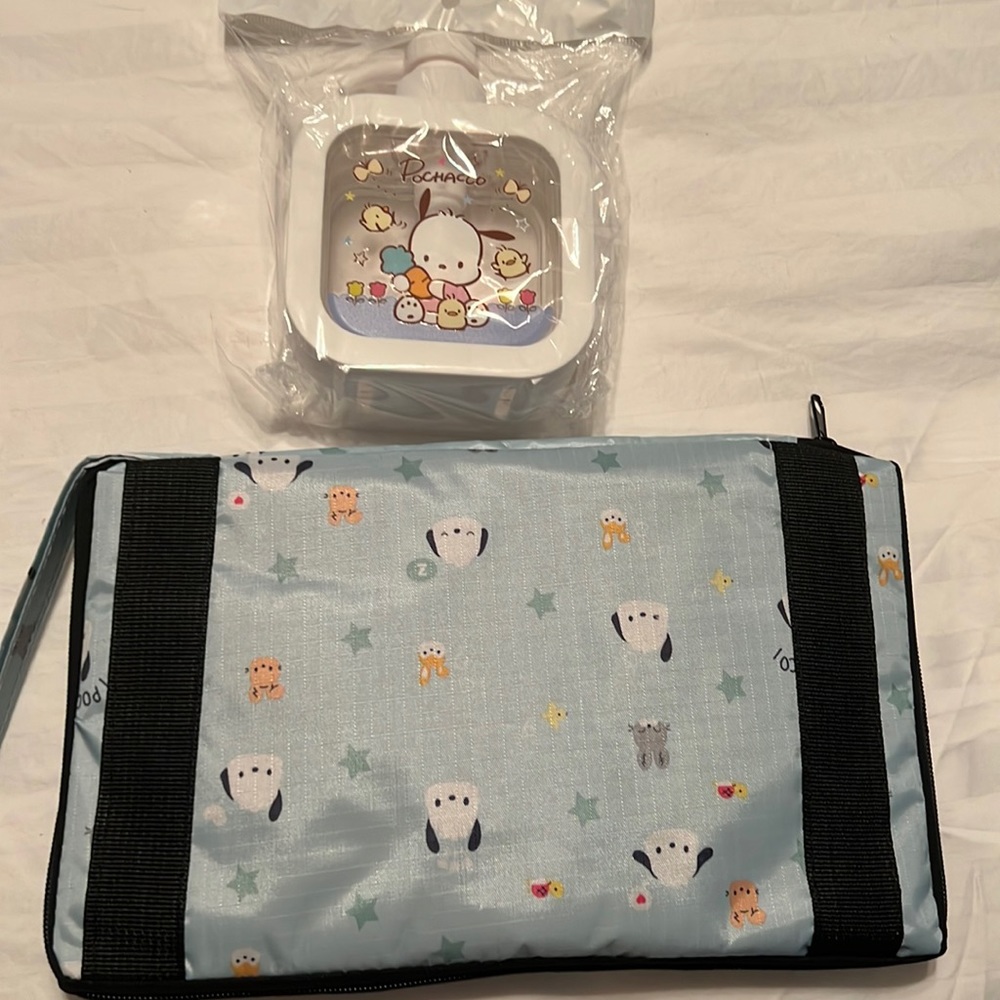Travel duffel bag with soap dispenser